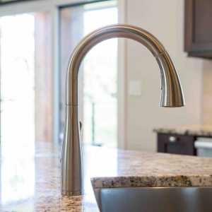 elegant kitchen faucet in luxury home